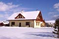 Zasnežená záhrada Apartmány Eva